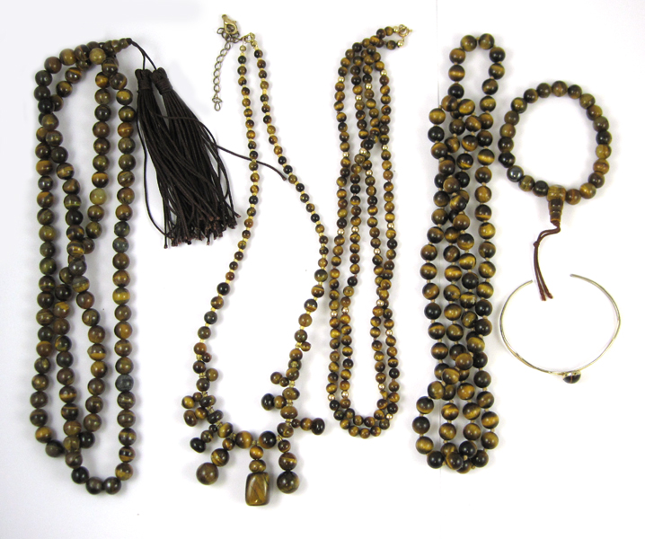 Appraisal: SIX ARTICLES OF TIGER'S EYE JEWELRY including four necklaces strung