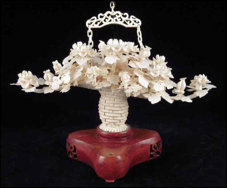 Appraisal: CHINESE CARVED IVORY FLORAL GROUP IN BASKET H '' Condition