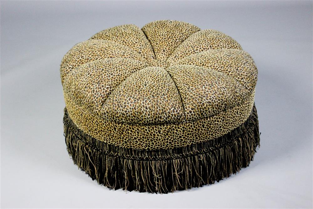 Appraisal: THE CHARLES STEWART CO LEOPARD PRINT CIRCULAR UPHOLSTERED OTTOMAN shaped