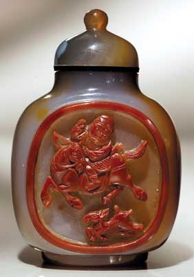 Appraisal: CARVED AGATE SNUFF BOTTLE Finely hollowed antique carved carnelian chalcedony