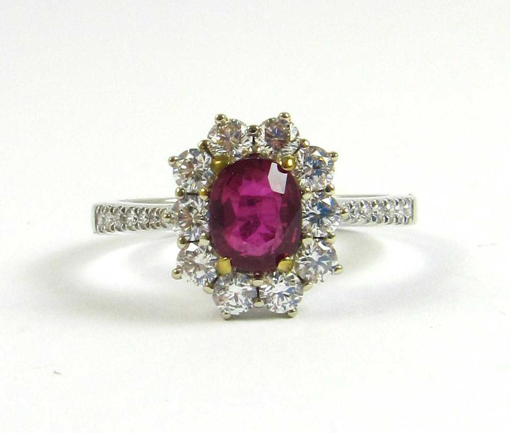 Appraisal: RUBY AND DIAMONDS RING Oval-cut ruby ct Round-cut diamonds cttw