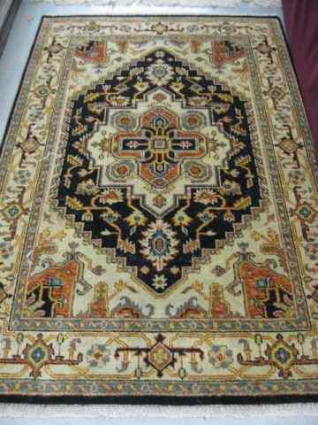 Appraisal: Heriz Persian Handmade Rug geometric designs on ivory indigio field