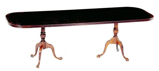 Appraisal: Miniature Chippendale style mahogany dining table rectangular top with rounded