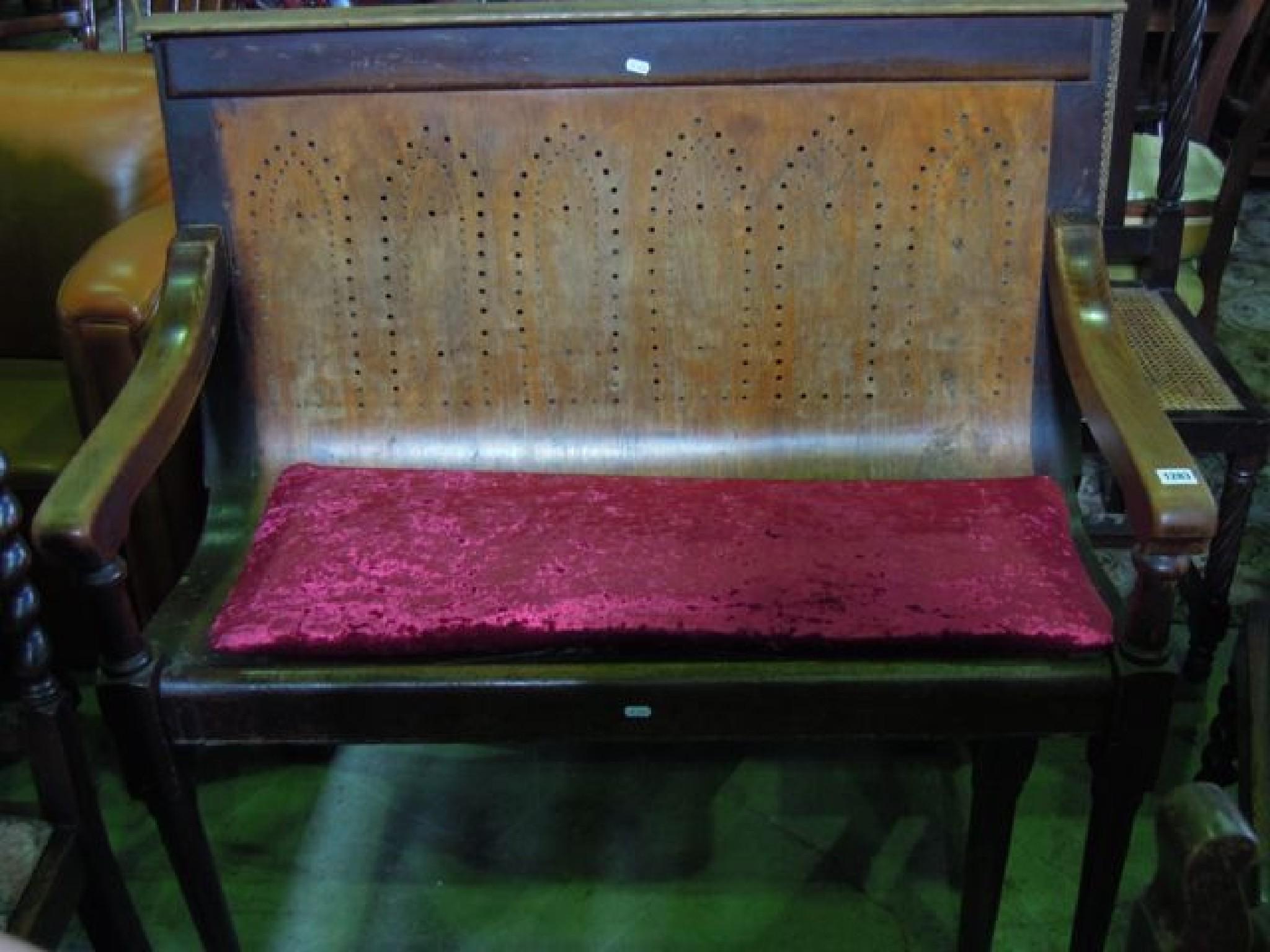 Appraisal: A vintage weighting room platform bench with pierced panelled back