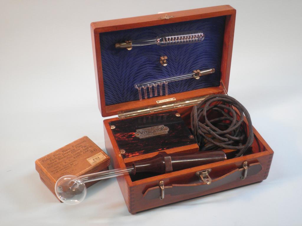 Appraisal: A Roger's Vitalator in a mahogany case and a cardboard