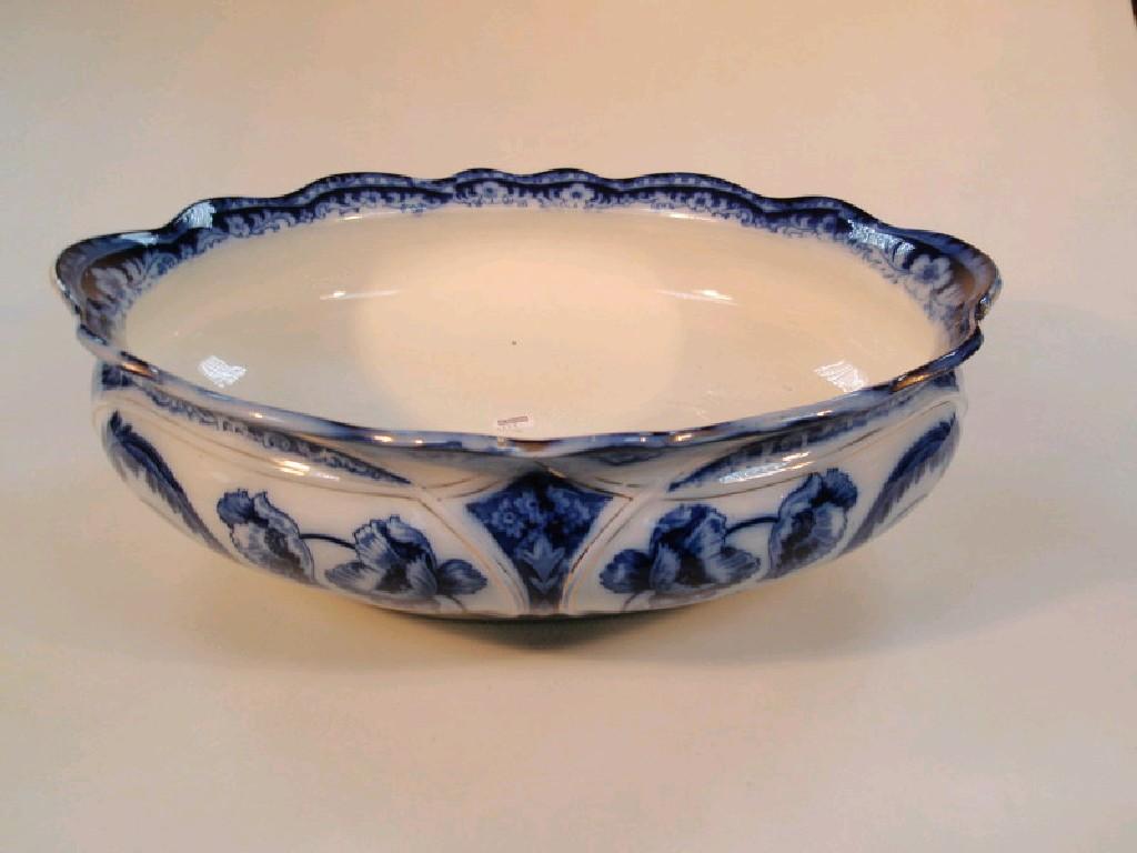 Appraisal: An Edwardian Staffordshire flow blue oval toilet basin by Ford