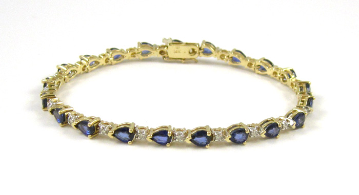 Appraisal: SAPPHIRE DIAMOND AND FOURTEEN KARAT GOLD BRACELET measuring - inches