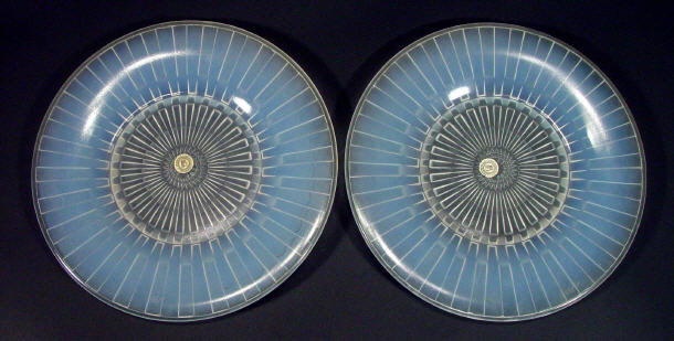 Appraisal: Pair of opalescent French glass plates with moulded decoration by