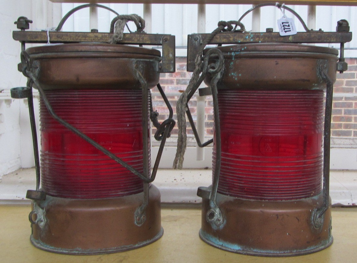 Appraisal: A pair of late th century copper port ships lanterns