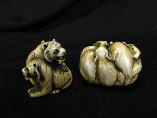 Appraisal: Two Carved Japanese Netsuke including nest of rats signed and