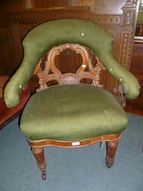 Appraisal: A VICTORIAN WALNUT FRAME TUB CHAIR with horse-shoe shaped back