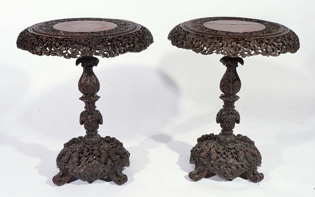 Appraisal: A PAIR OF CARVED BURMESE CIRCULAR TABLES with foliate borders