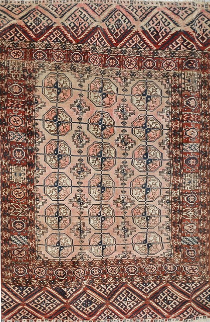 Appraisal: A TEKKE WINE GROUND RUG decorated three rows of octagonal