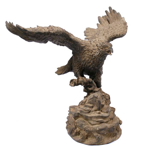 Appraisal: A patinated bronze figure of an eagle height in width