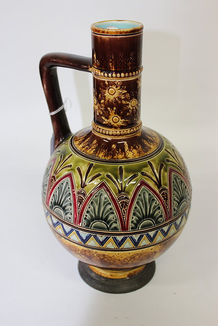 Appraisal: AN AESTHETIC DESIGNED MAJOLICA JUG in the manner of Christopher