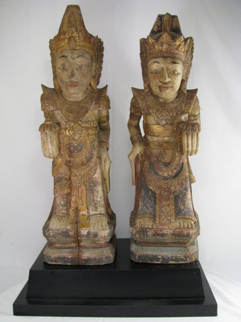 Appraisal: Pair of old Bali wood carved polychrome male and female