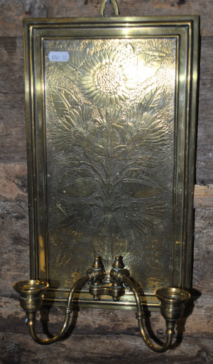 Appraisal: An Arts Crafts copper girandole engraved with sunflower with twin