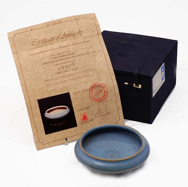 Appraisal: A Chinese blue ground shallow bowlKuang Hsuin a lined box