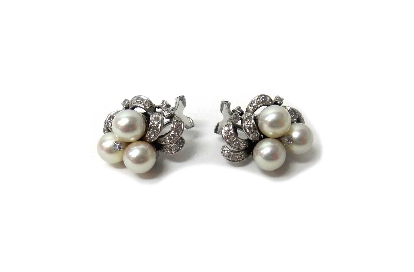 Appraisal: A pair of white gold cultured pearl and diamond set