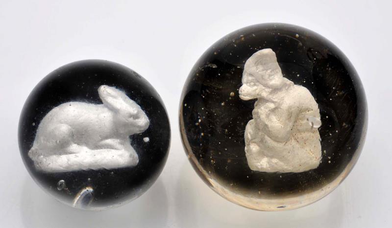 Appraisal: Lot of Sulphide Marbles The smaller is a rabbit and