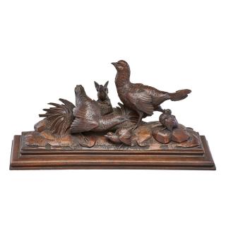 Appraisal: BLACK FOREST CARVING OF WILDFOWL Two adult grouse and three