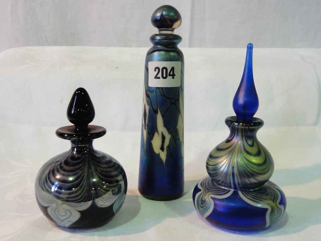 Appraisal: A collection of three Okra scent bottles and stoppers with