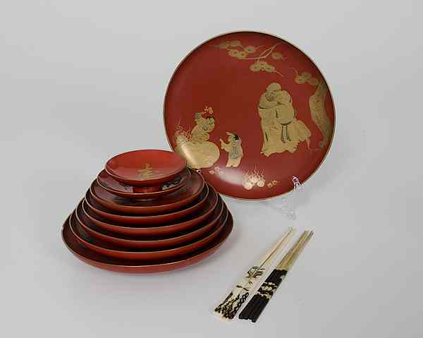 Appraisal: Japanese Lacquer Plates and Chopsticks Japan Nine graduated lacquer plates