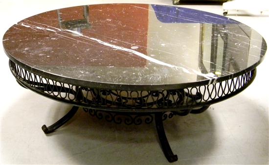 Appraisal: Round black marble top coffee table with scrolled black iron