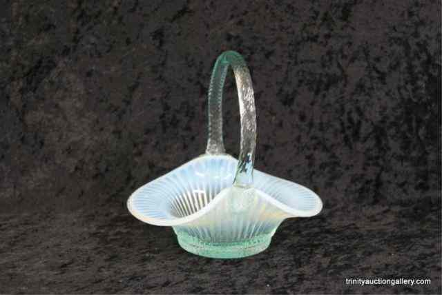 Appraisal: Fenton Ice Blue Opalescent Glass Basketc 's with Fenton mark