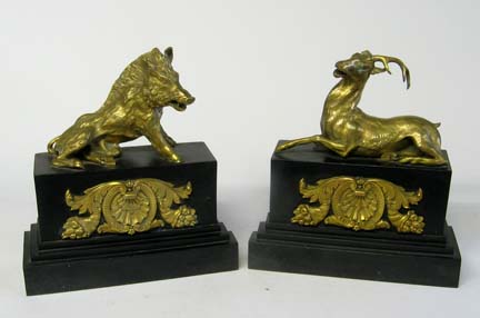 Appraisal: Pair of French cast iron and gilt bronze mounted chenet