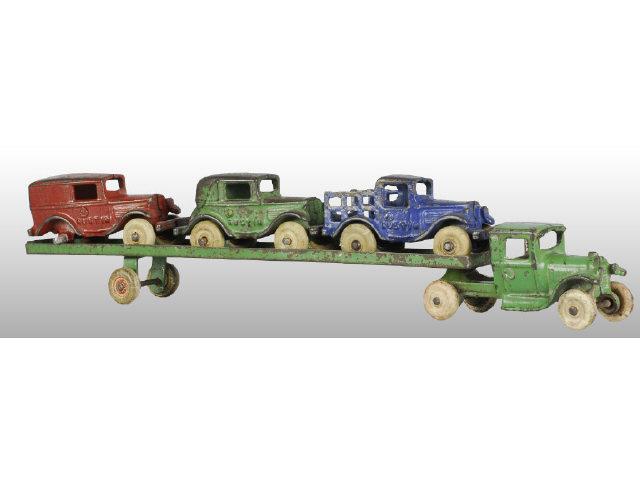 Appraisal: Cast Iron Arcade Car Carrier Toy with Autos Description Green