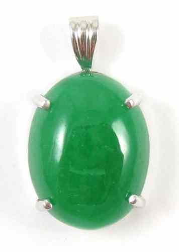 Appraisal: JADE AND WHITE GOLD PENDANT with a large oval green