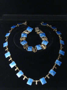 Appraisal: A silver and pale blue enamel necklace and bracelet set