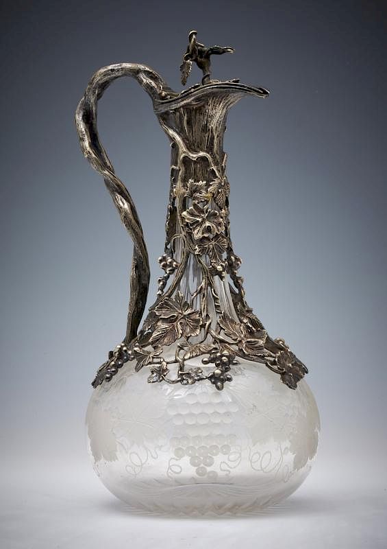 Appraisal: Silverplate overlay claret decanter grapevine motif Silverplate overlay crystal claret