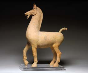 Appraisal: LARGE HAN DYNASTY POTTERY HORSE Finely modeled and large Chinese