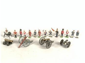 Appraisal: An assembled collection of vintage lead soldiers and steel cannons