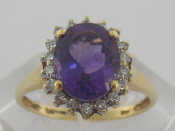 Appraisal: A carat yellow gold amethyst and diamond ring the central