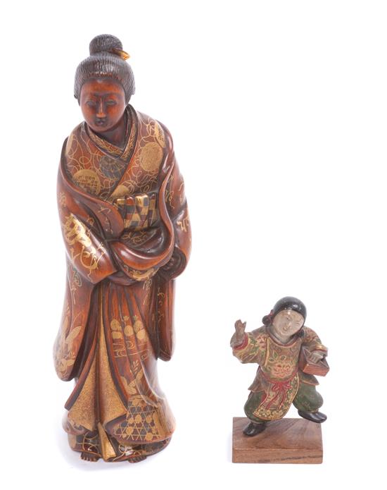 Appraisal: Sale Lot Two Japanese Lacquered Wood Figures one depicting a