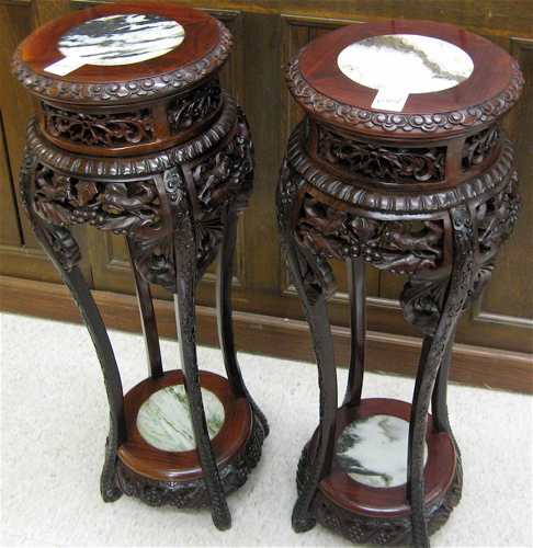 Appraisal: A PAIR OF CARVED ROSEWOOD PEDESTAL TABLES Chinese early th