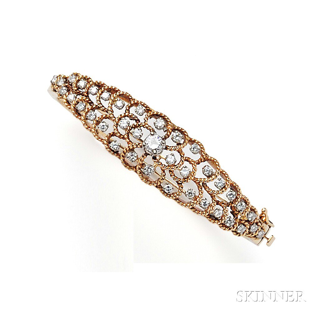 Appraisal: kt Gold and Diamond Bracelet the hinged bangle set with