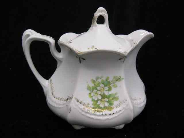 Appraisal: R S Prussia Porcelain Syrup Pitcher floral footed '' signed