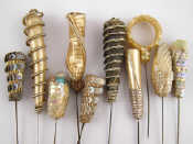 Appraisal: A mixed lot of hat pins with various forms of