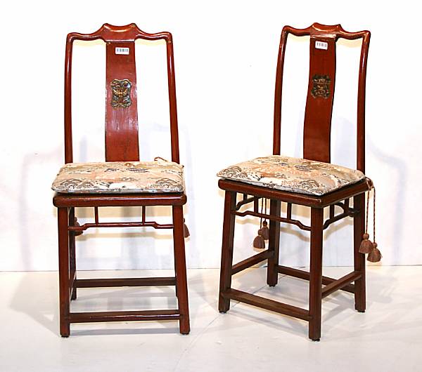 Appraisal: Four red lacquered wood side chairs The back panel of