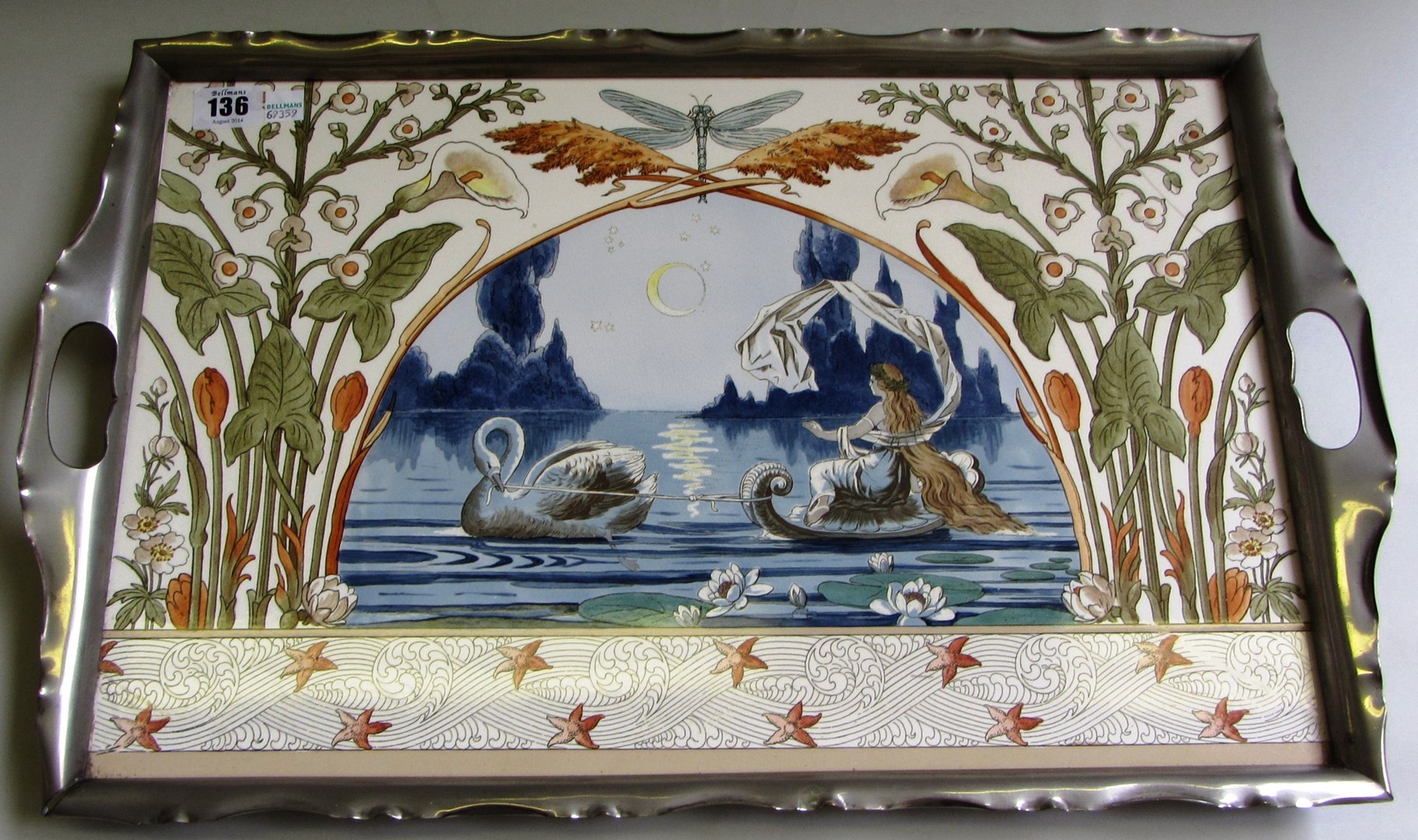 Appraisal: A Continental pottery serving tray Art Nouveau style detailed with