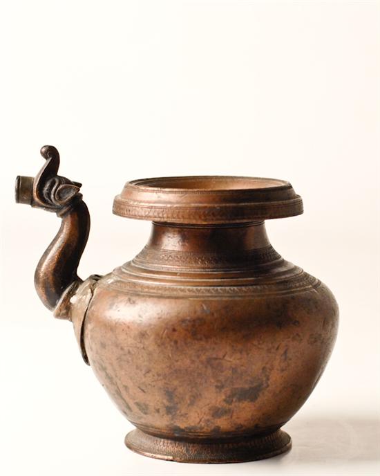 Appraisal: A Sino-Tibetan Water Vessel of metal with a figural spout