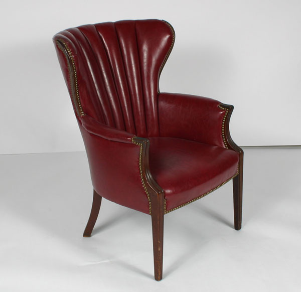 Appraisal: Wing back chair Deco styling wood legs red vinyl tufted