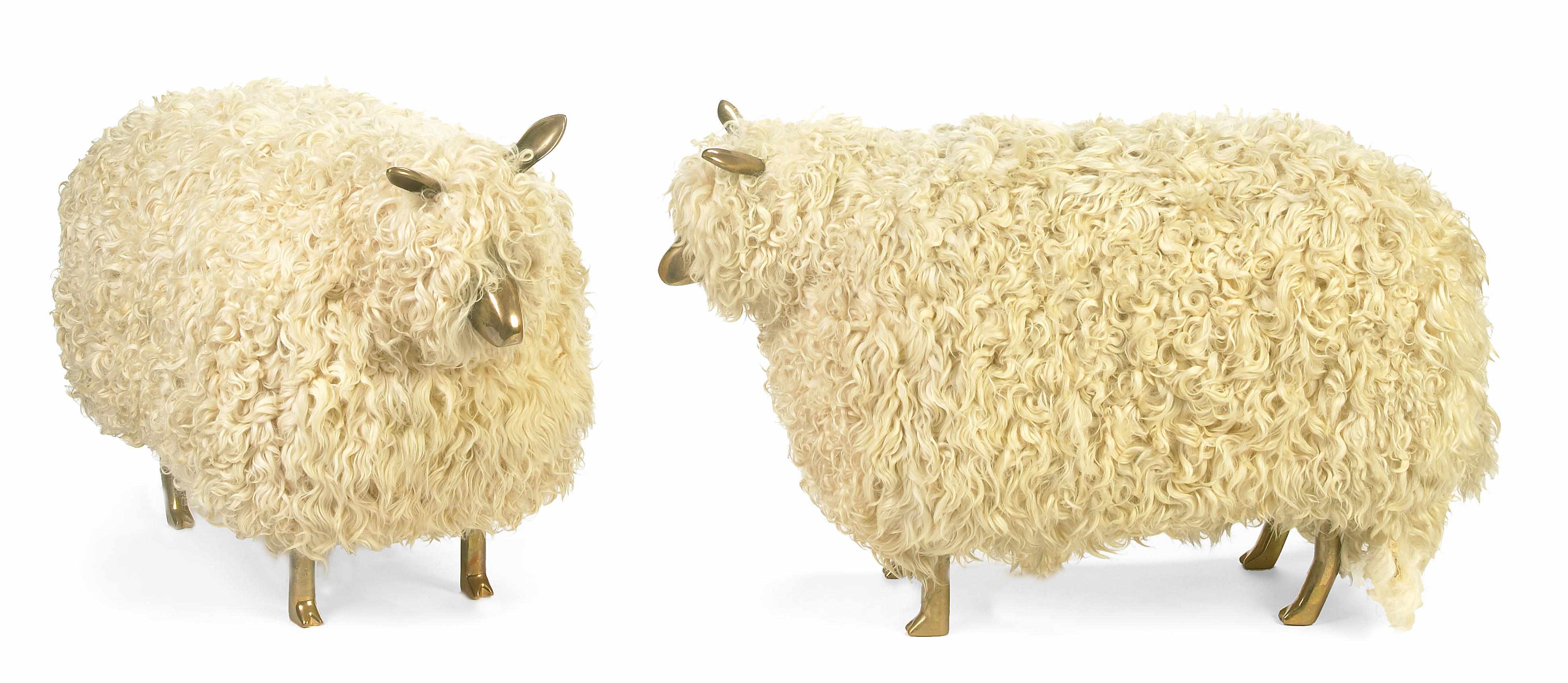 Appraisal: A pair of gilt bronze and wool sheep second half