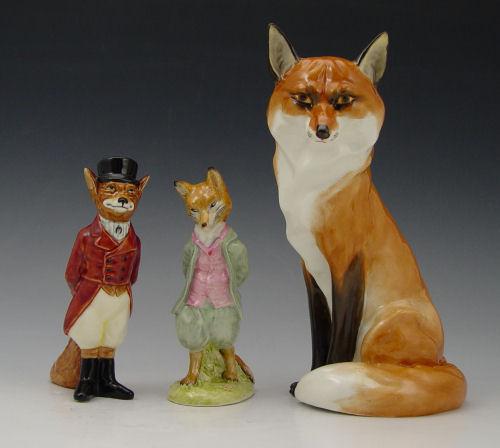 Appraisal: ENGLISH PORCELAIN FOX FIGURINES Large Royal Worcester '' tall Beatrix