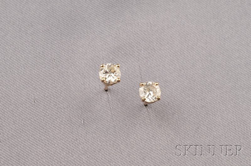 Appraisal: kt Gold and Diamond Stud Earrings each prong-set with a