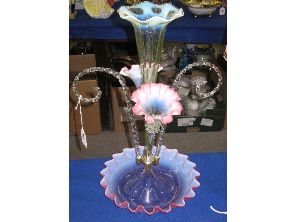 Appraisal: Glass epergne with three glass trumpets and two twisted canes